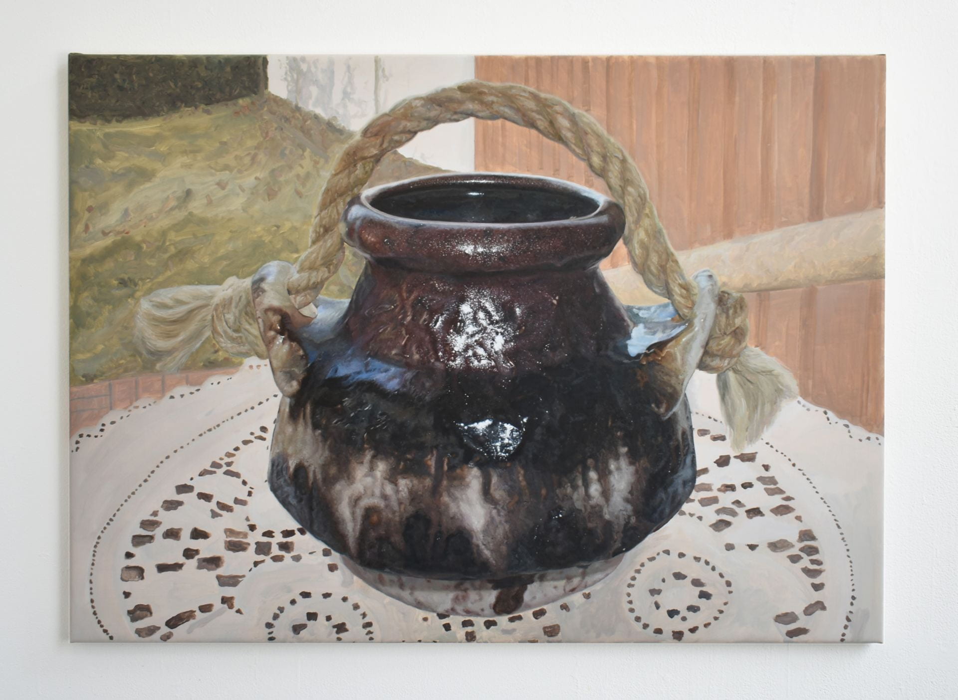A painting of a vase, seated on a table in someone's back yard. It has the bright white reflection of a camera flash reflecting off the dark, gory glaze.