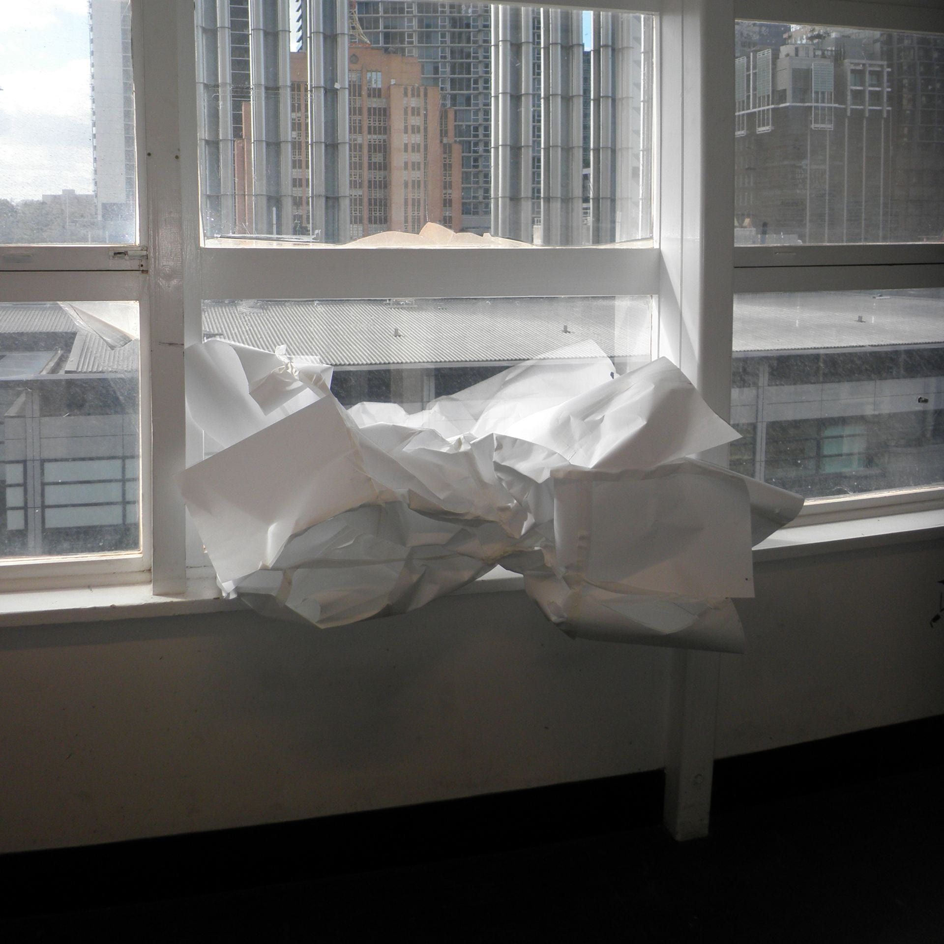 Paper sculpture sitting on window sill