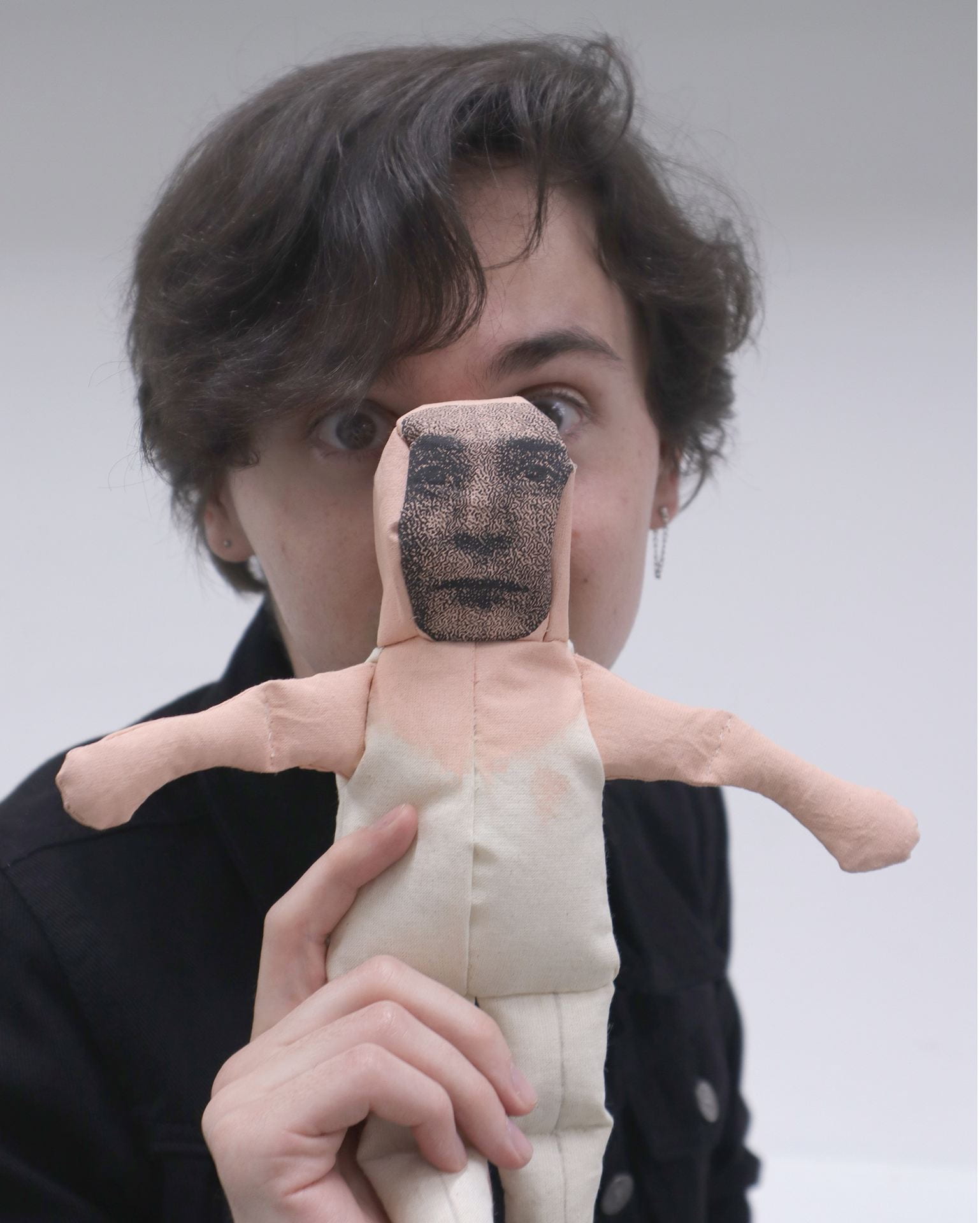 The artist pictured with the first of many dolls.
