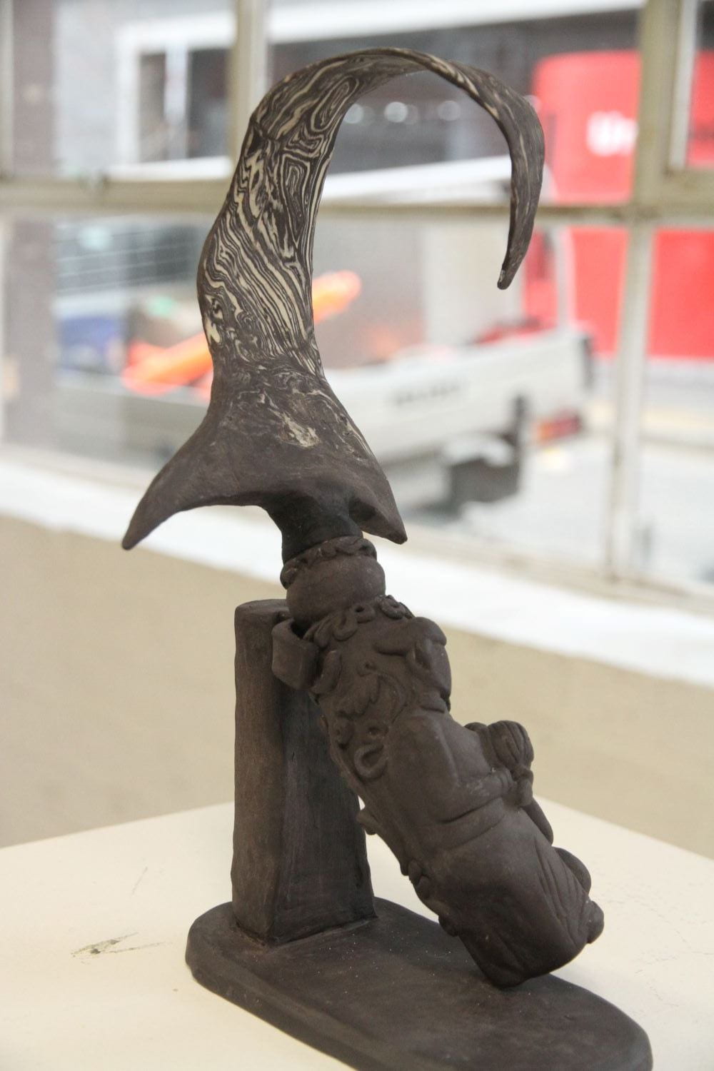 Small ceramic sculpture of Javanese ceremonial dagger.