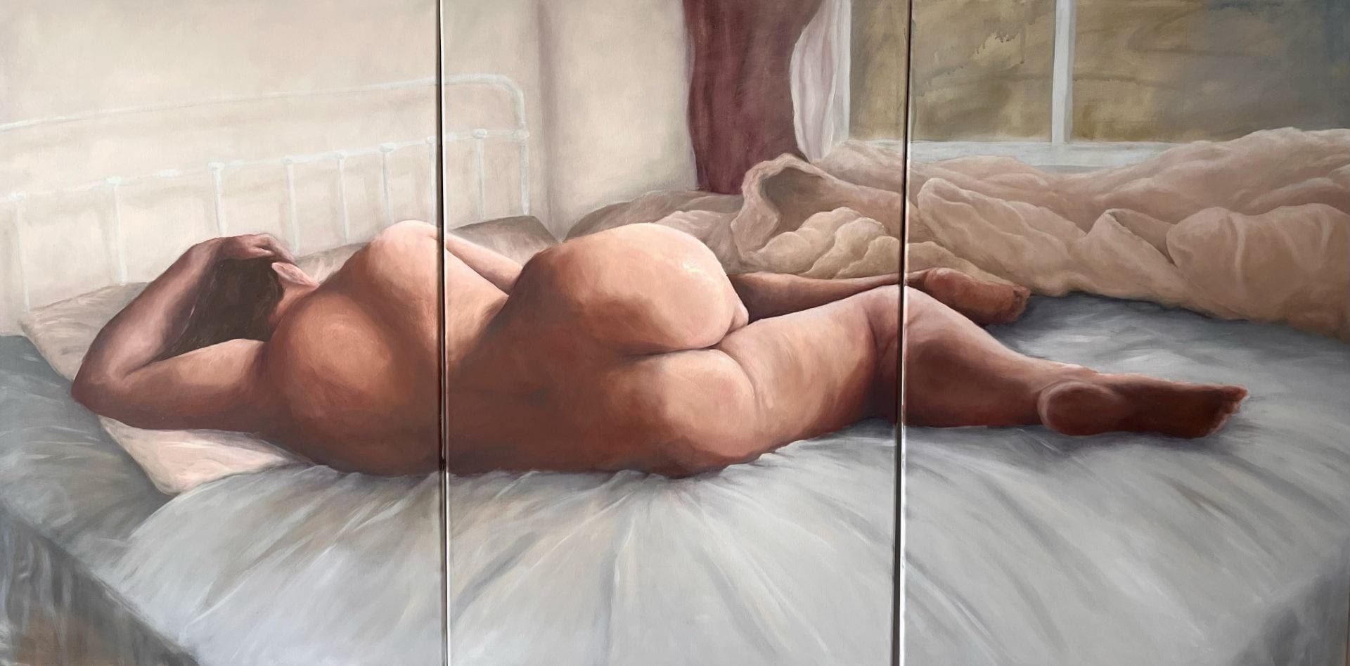 Oil painting depicting a female presenting figure reclining on a bed with back facing the viewer