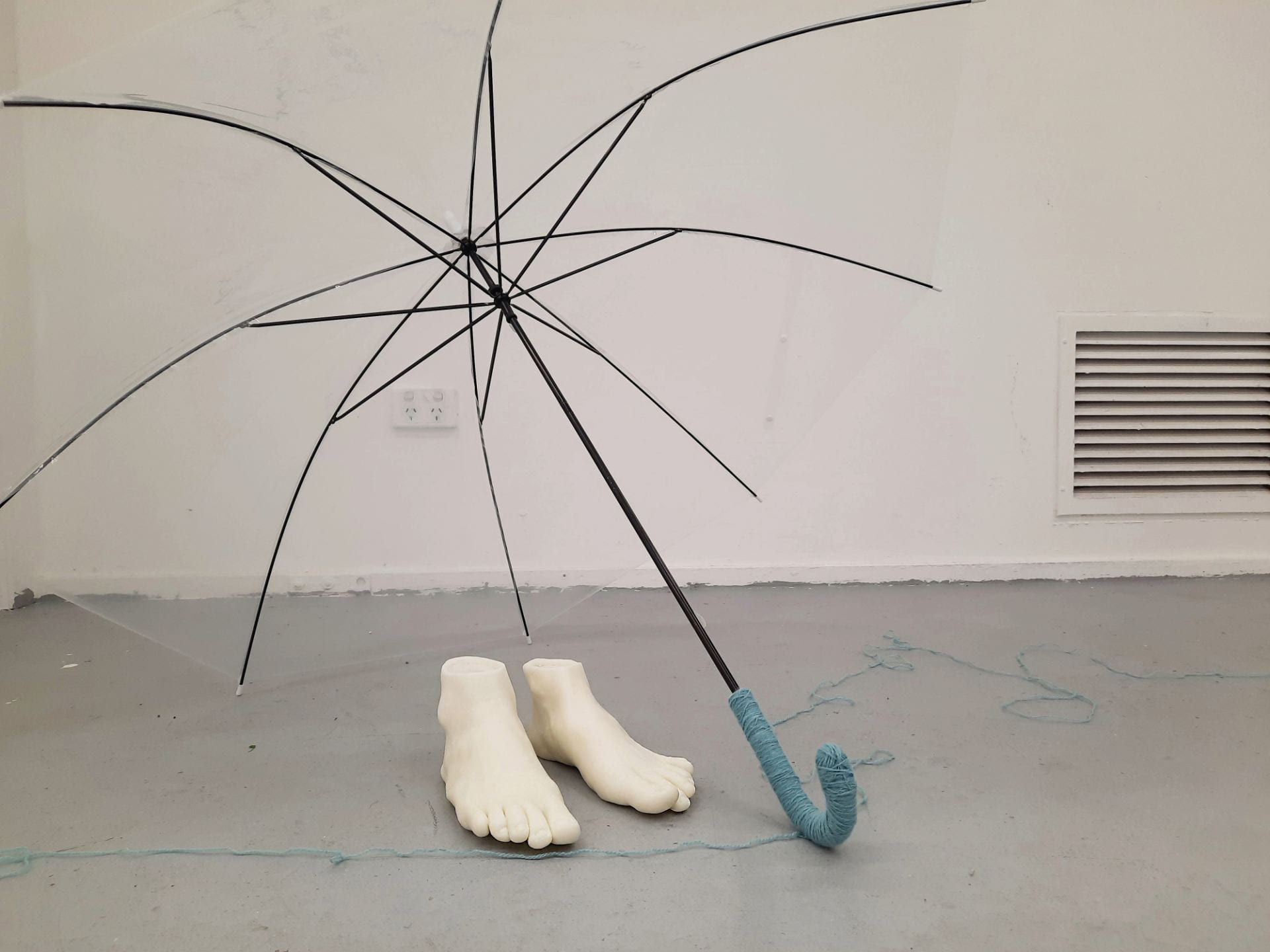 wax feet under the umbrella